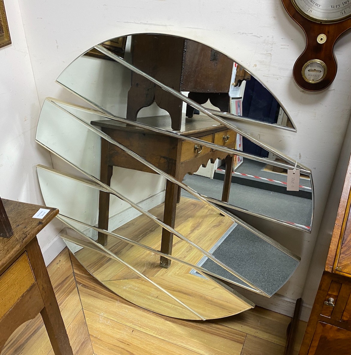 A contemporary circular wall mirror, diameter 112cm